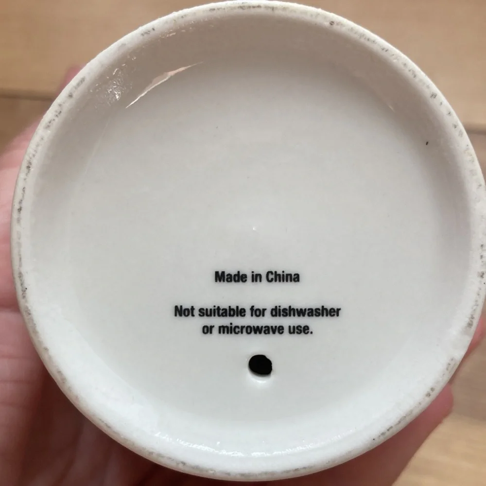 Lancôme ceramic 12 ounce tumbler.